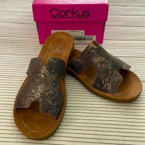 Corkys slip on sandals in gunmetal.